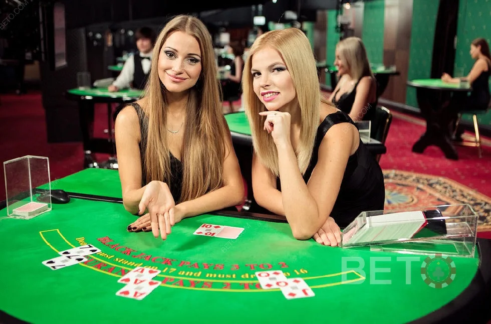 Ruang permainan kasino live dengan meja dan dealer